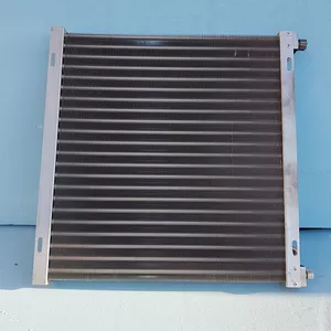 Радіатори (конденсатори) для комбайнів,  тракторів,  вантажівок,  легкови