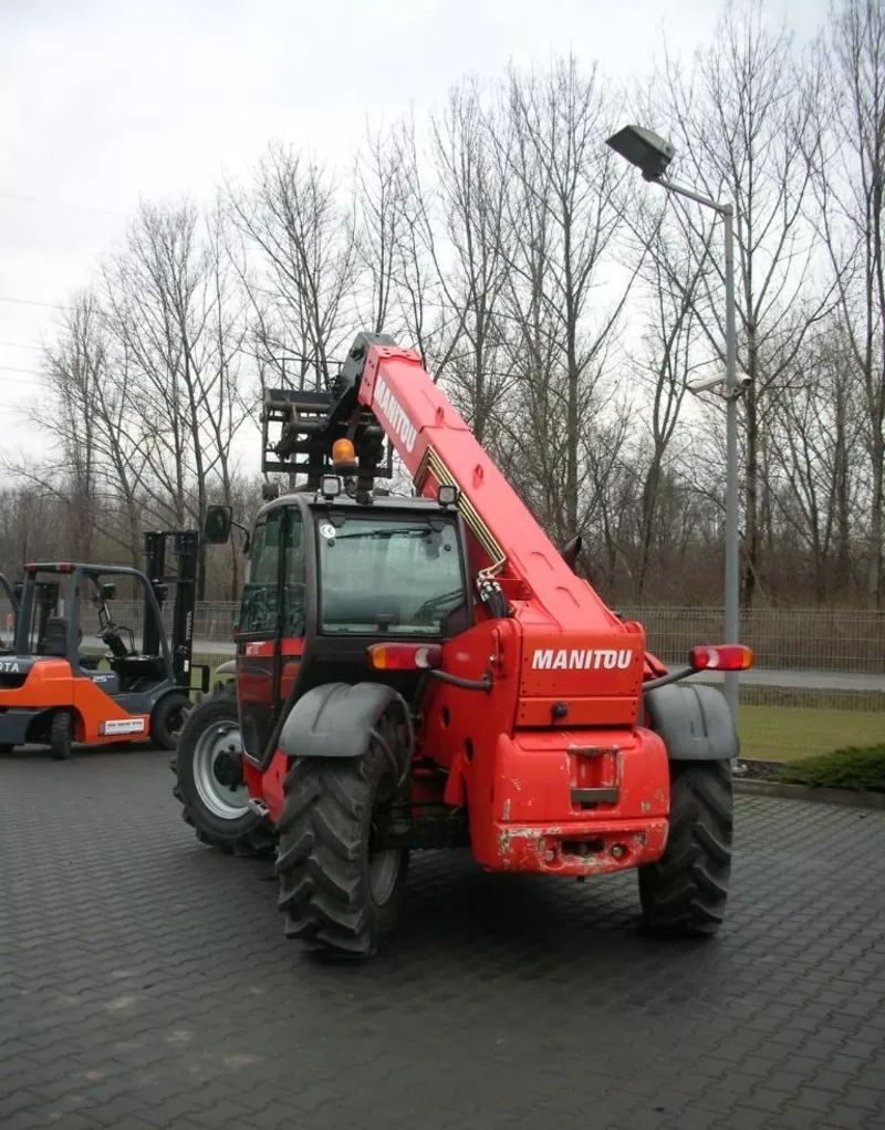 Телескопический погрузчик Manitou 731-120 3