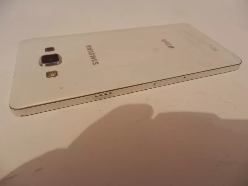 Мобильный телефон Samsung A700  7