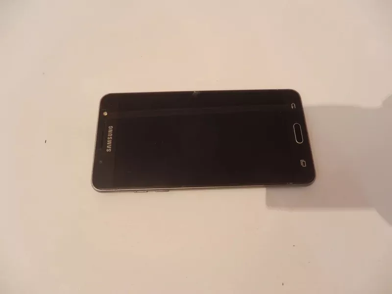 Мобильный телефон Samsung J510 4